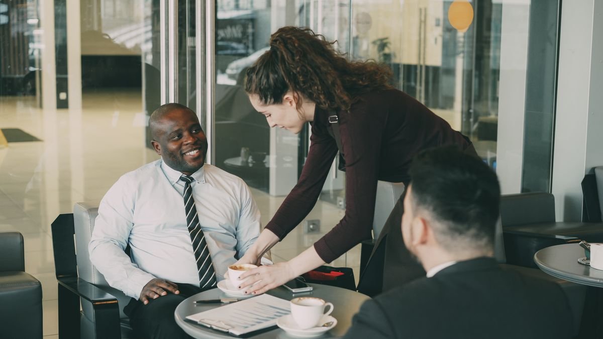 Professionals discussing career decisions during a thoughtful meeting