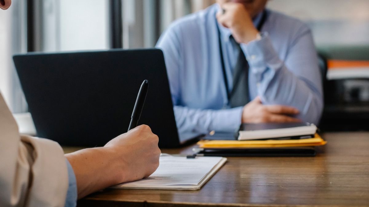 Job applicant completing an application during a first-job interview process