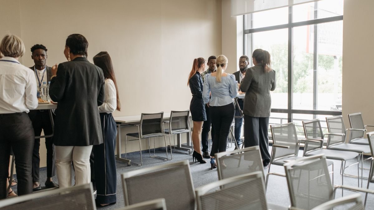 Professionals talking during a networking event
