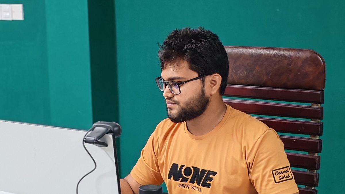 Young professional working at a computer in a modern office