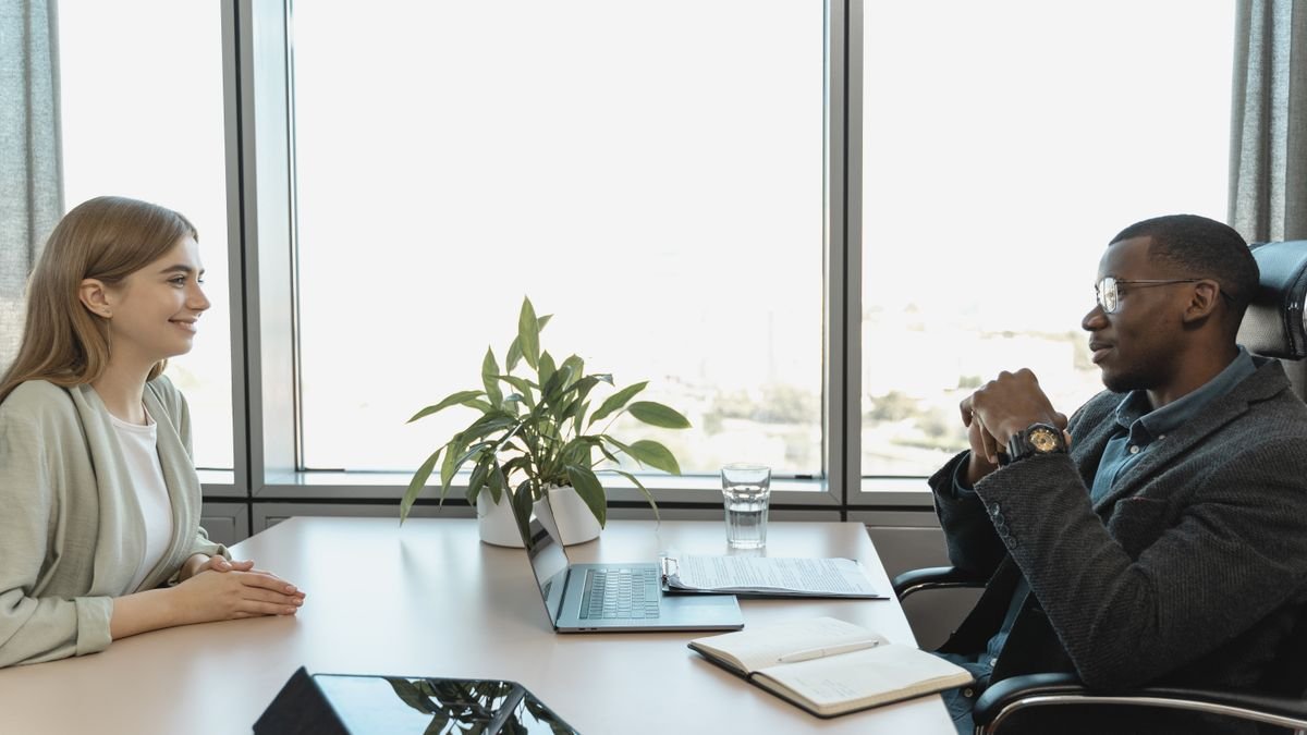 Candidate and interviewer having a focused professional conversation