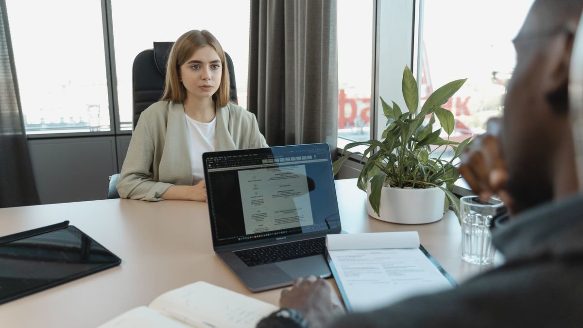 Candidate answering interview questions during a first job interview